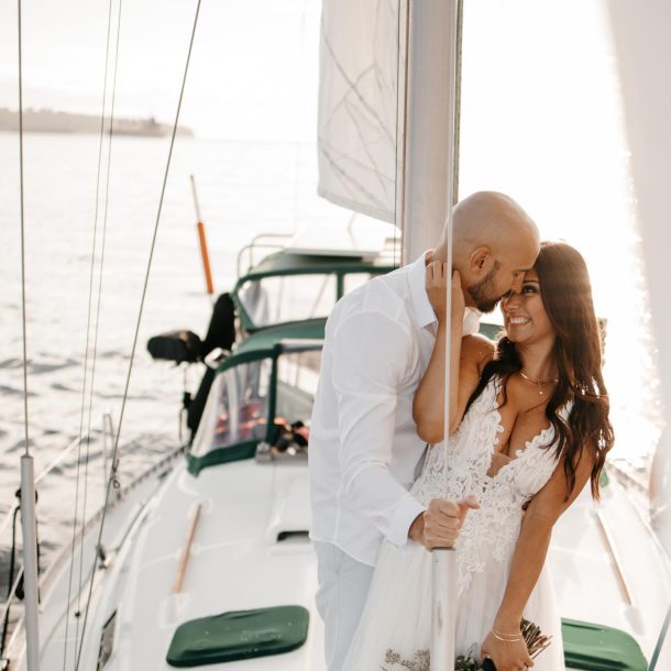 Couples engagement shoot and photos taken on a sailboat in Vancouver Harbour