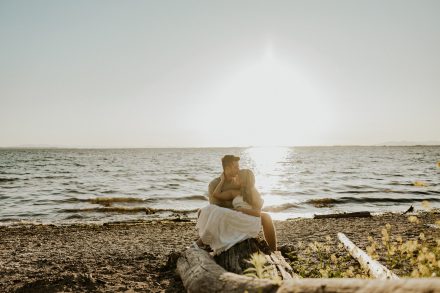 Engagement photoshoot in Vancouver BC at Crescent beach at sunset with a madly in love couple