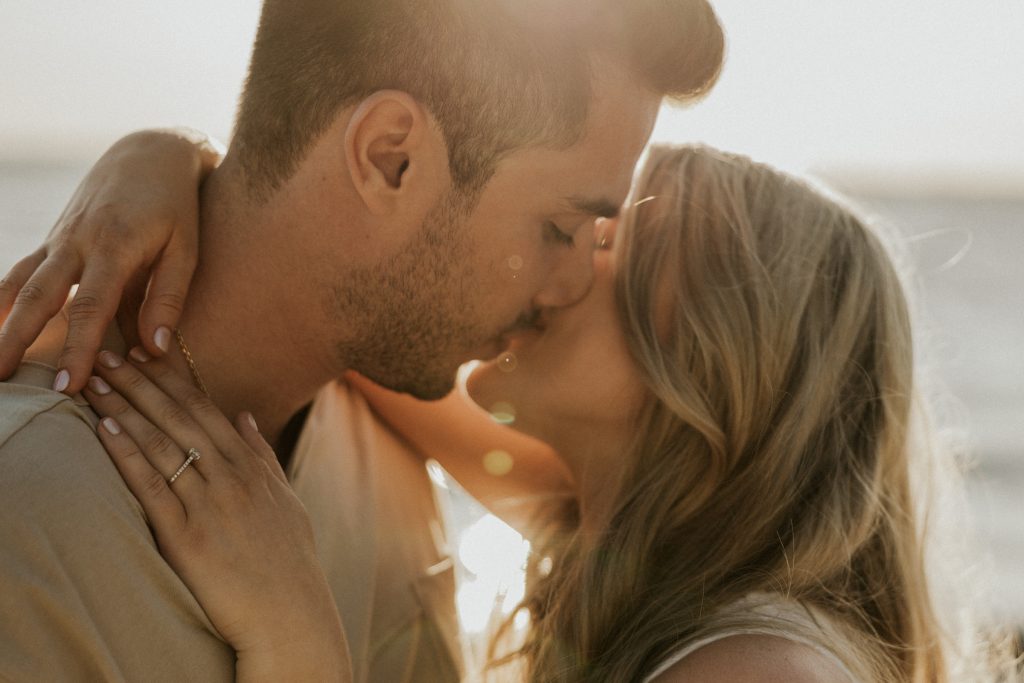 Engagement photoshoot in Vancouver BC at Crescent beach at sunset with a madly in love couple