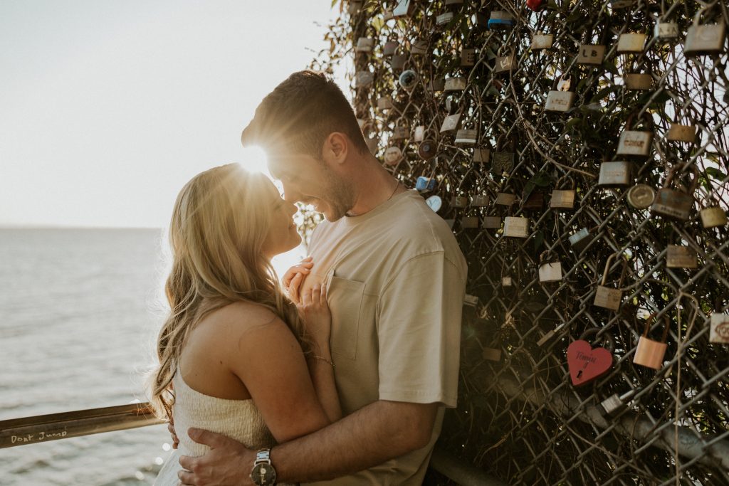 Engagement photoshoot in Vancouver BC at Crescent beach at sunset with a madly in love couple