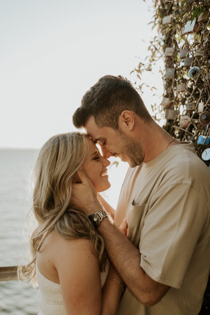 Engagement photoshoot in Vancouver BC at Crescent beach at sunset with a madly in love couple