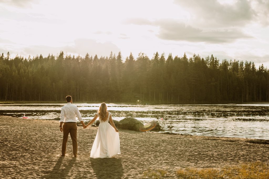 Candid laughter by Whonnock Lake at sunset, Fraser Valley wedding photography