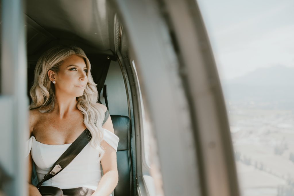 Helicopter elopement at the top of the mountain peeks over the fraser valley. Helicopter flight with Sky helicopters. bridal portraits