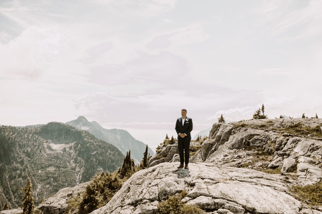 Helicopter elopement at the top of the mountain peeks over the fraser valley. Helicopter flight with Sky helicopters. bridal portraits