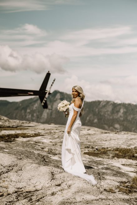 Helicopter elopement at the top of the mountain peeks over the fraser valley. Helicopter flight with Sky helicopters. bridal portraits