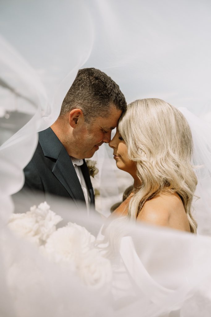 Helicopter elopement at the top of the mountain peeks over the fraser valley. Helicopter flight with Sky helicopters. bridal portraits