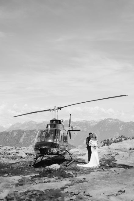 Helicopter elopement at the top of the mountain peeks over the fraser valley. Helicopter flight with Sky helicopters