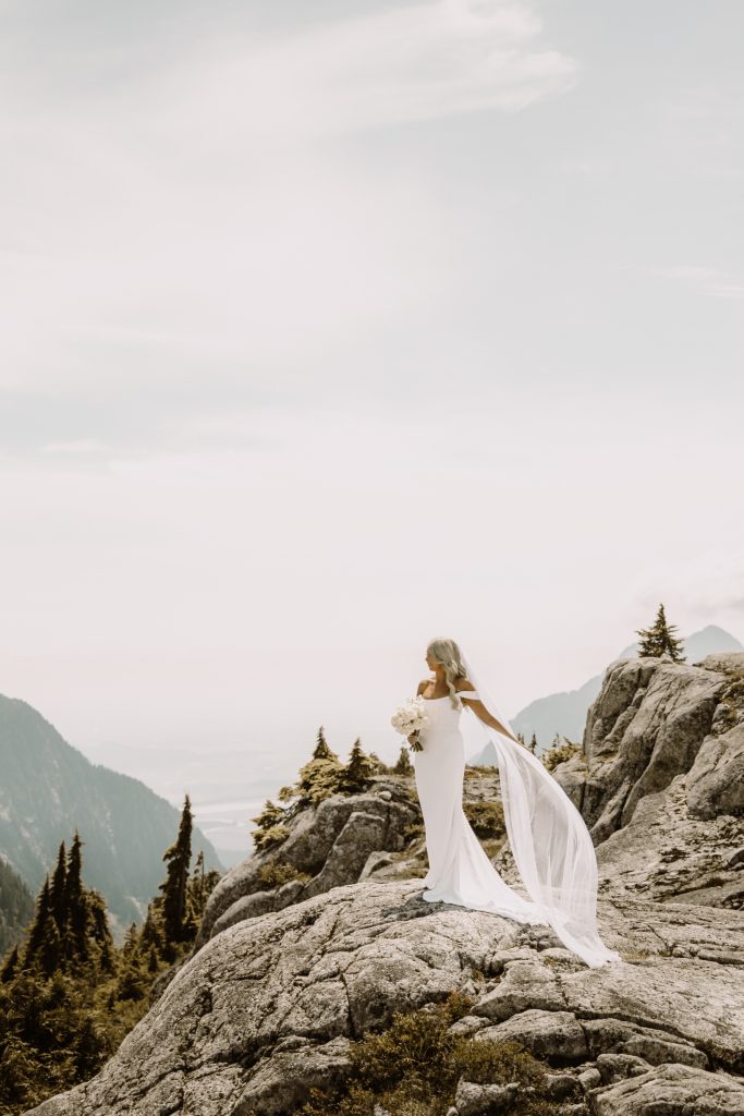 Helicopter elopement at the top of the mountain peeks over the fraser valley. Helicopter flight with Sky helicopters