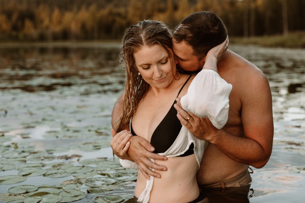 Unrestrained affection captured by the lake's edge, authentic couple moments Fraser Valley