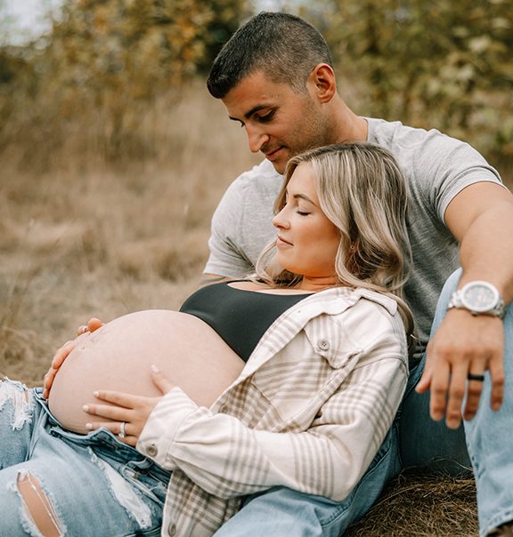Maternity photoshoot of husband and wife 1 week before baby was due