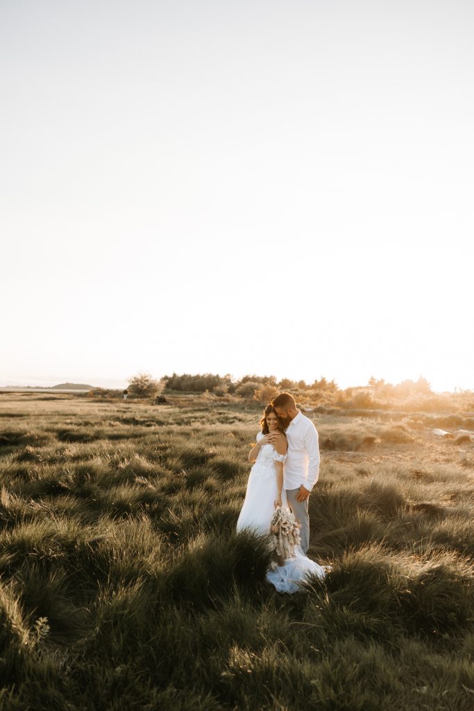 Ocean front elopement with bride and groom soaking up the moment