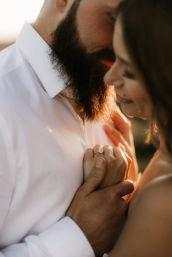 Ocean front elopement with bride and grooms intimate embrace