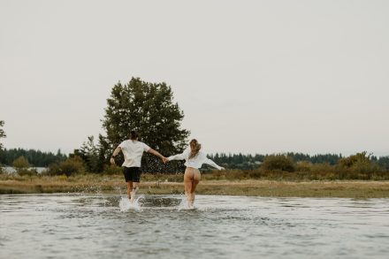 Serene ocean embrace during romantic couples session at Mud Bay in Vancouver