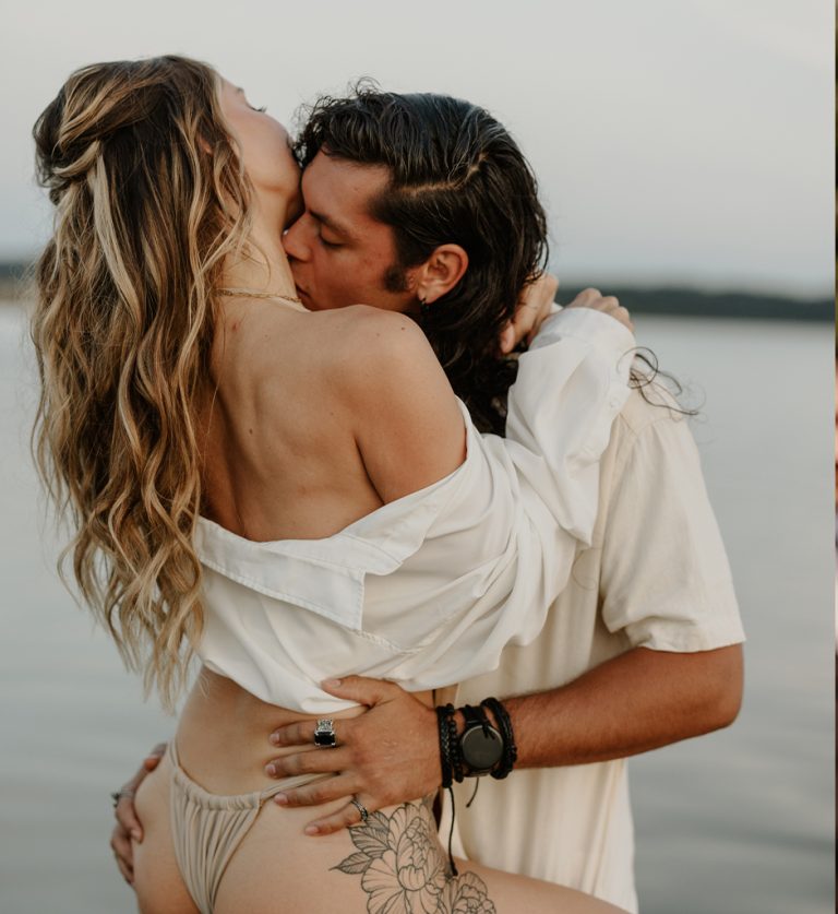 Serene ocean embrace during romantic couples session at Mud Bay in Vancouver