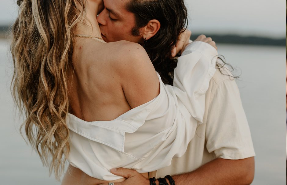 Serene ocean embrace during romantic couples session at Mud Bay in Vancouver