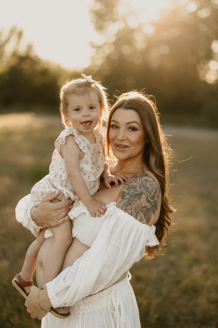 Heartfelt maternity image in Vancouver field capturing joy and anticipation of motherhood