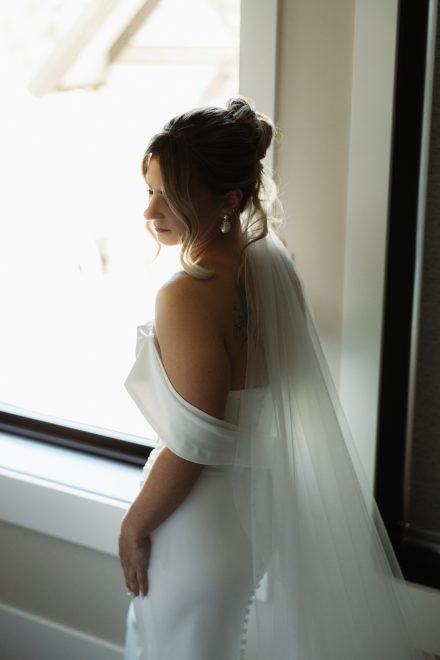 Melissa in her MWL Bride wedding dress from Everly Bridal, ready for her Abbotsford family backyard wedding