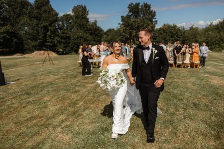 Guests watching an emotional ceremony moment at a family backyard wedding in Abbotsford, BC