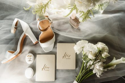 Melissas flat lay details, shoes, vow books, florals and rings