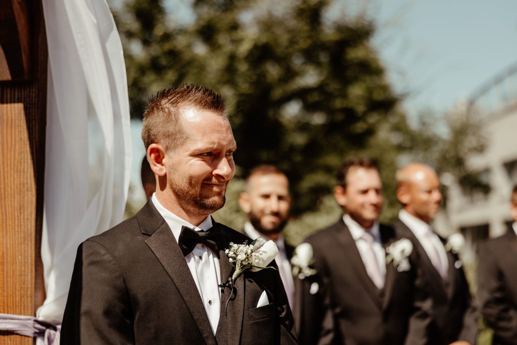 Groom overcome with emotion as he sees the bride for the first time